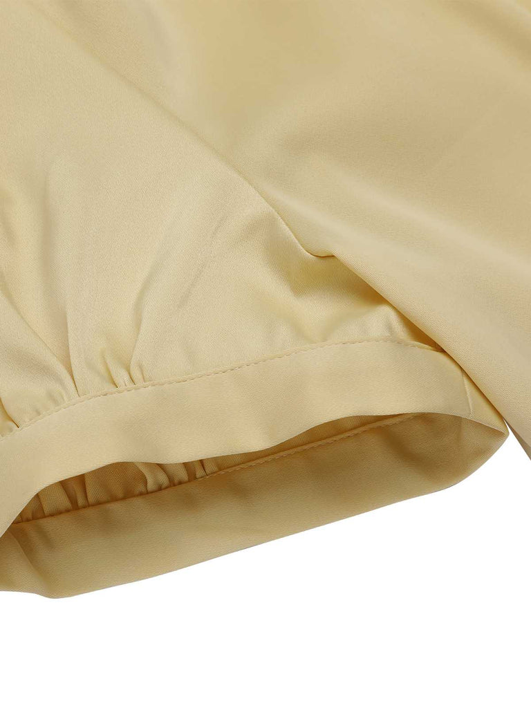 Abito due pezzi revers maniche a sbuffo anni '40