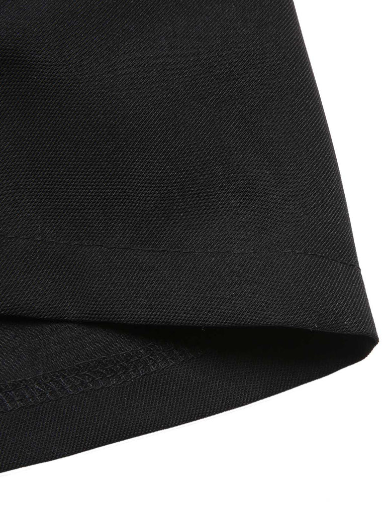 Tuta lunga con colletto arricciato e fiocco nero anni '30