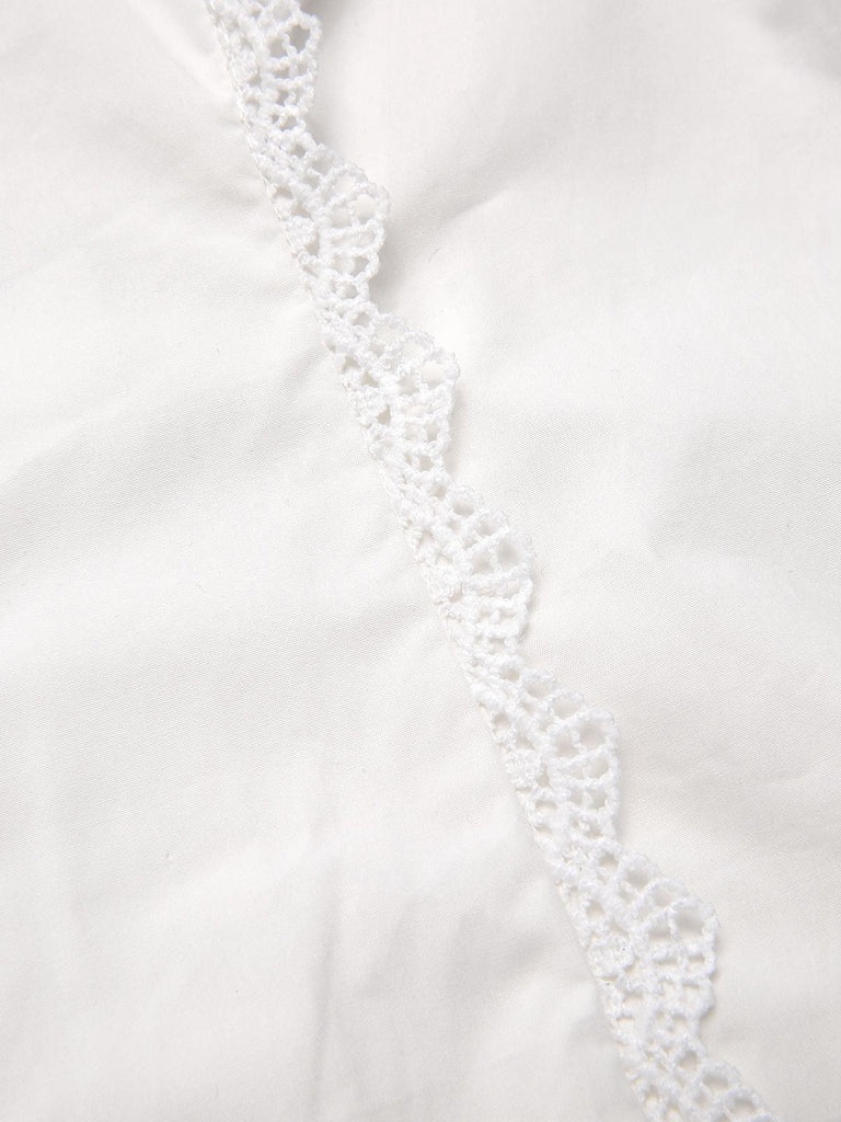 Camicetta in cotone con fiocco al collo biano anni '50