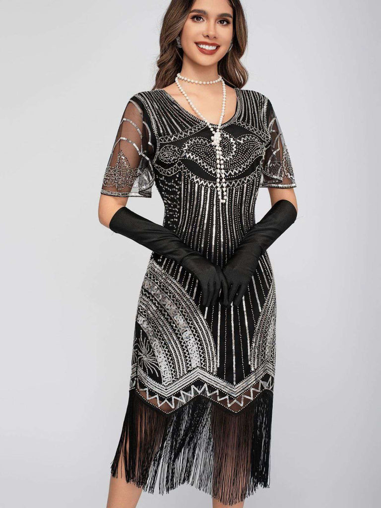 Abito Charleston nappe in paillettes  con scollo a barchetta anni '20