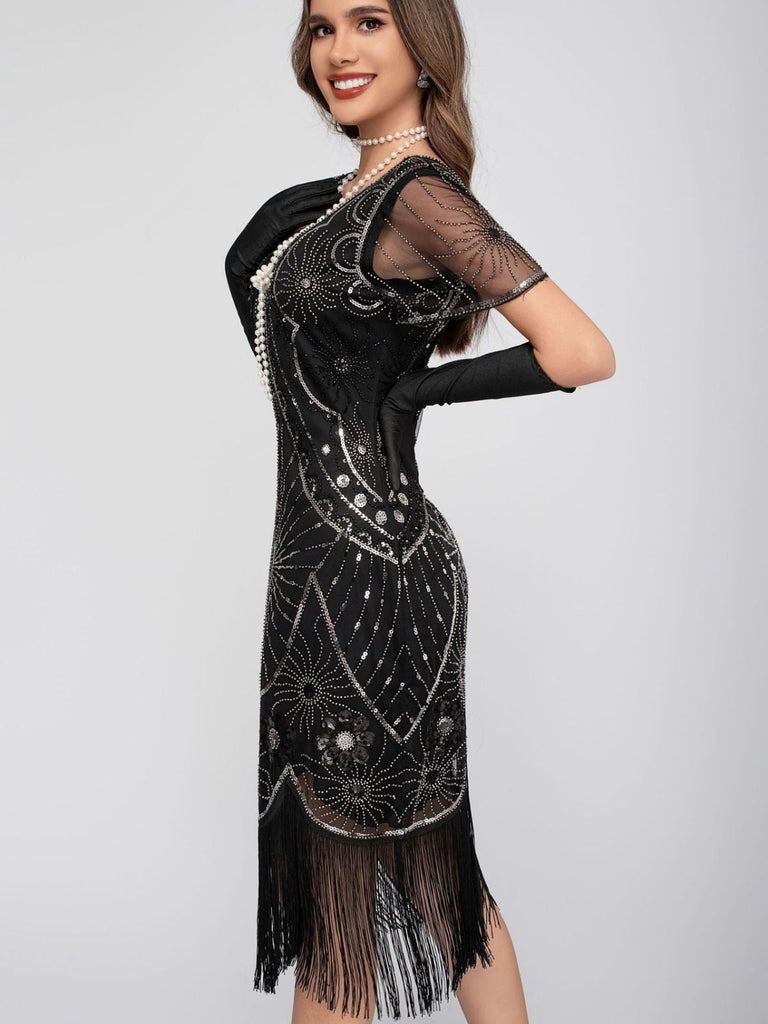 Abito flapper con frange di paillettes e scollo a barchetta anni '20