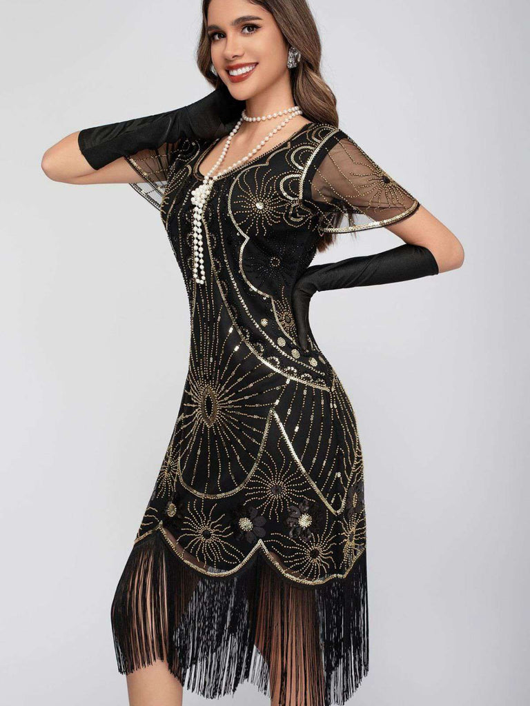 Abito flapper con frange di paillettes e scollo a barchetta anni '20
