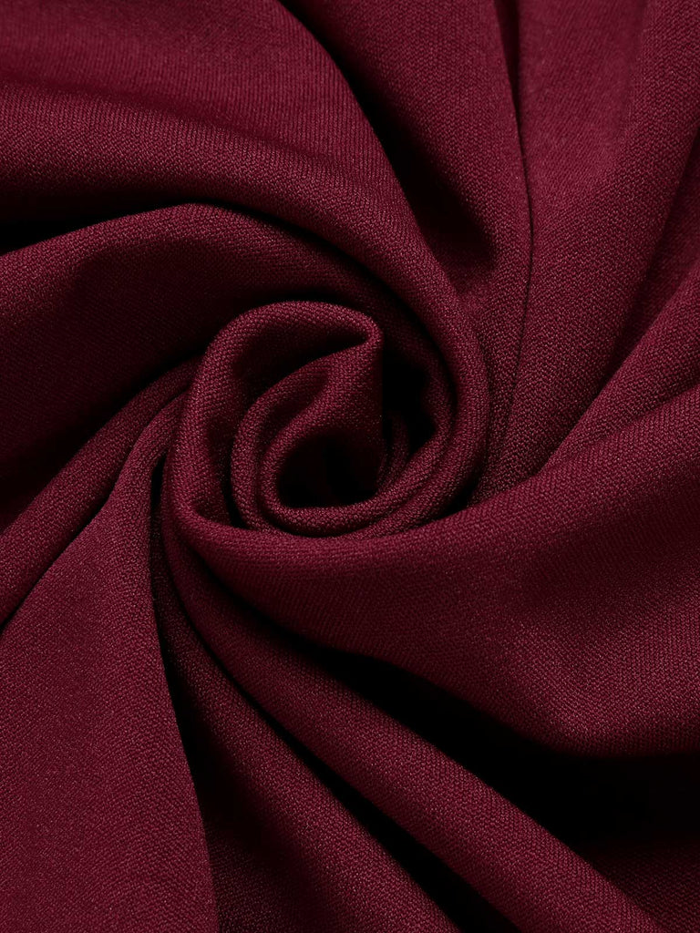 Abito a maniche lunghe con revers rosso violaceo anni '40