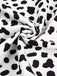 Abito con macchie di mucca patchwork nero anni '70
