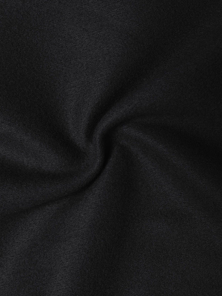 Cappotto con maniche a lanterna e ampi revers nero anni '60