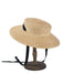Cappello in rafia intrecciata con nastro nero