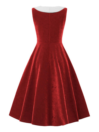 Abito in velluto con collo di pelliccia rosso anni '50