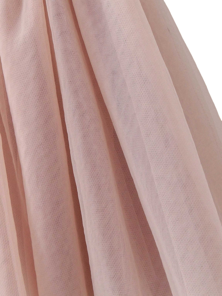Abito in tulle con fiocco e spalline sottili anni '70