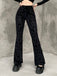 Pantaloni bootcut in velluto con stampa punk anni '80