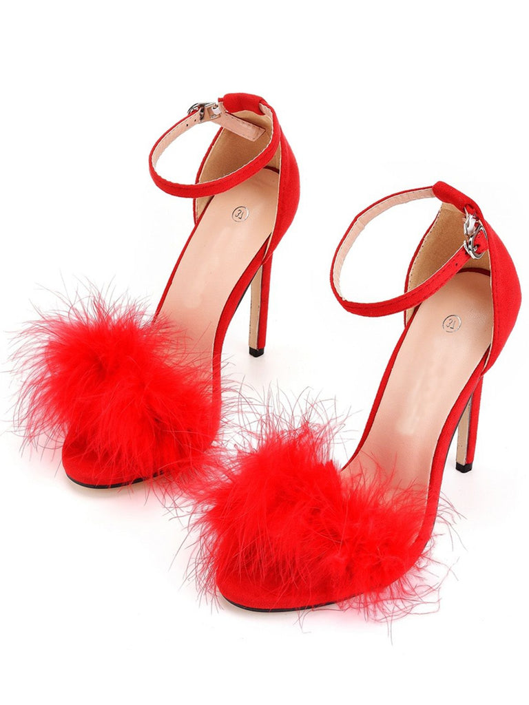 Tacchi alti con cinturino in pelle scamosciata e piume