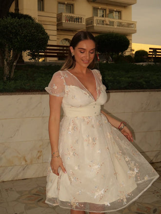 Abito ricami floreale scollo a V profondo bianco anni '50