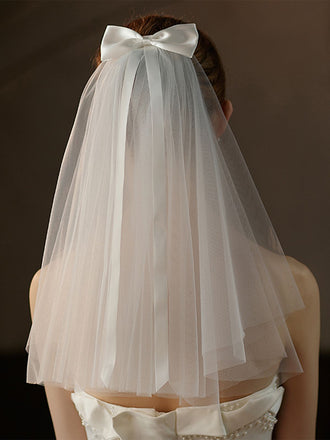 Velo da sposa con fiocco bianco vintage