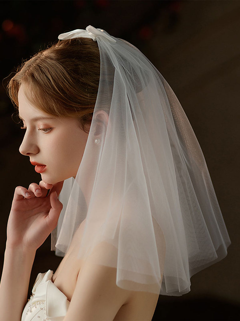 Velo da sposa con fiocco bianco vintage