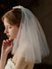 Velo da sposa con fiocco bianco vintage