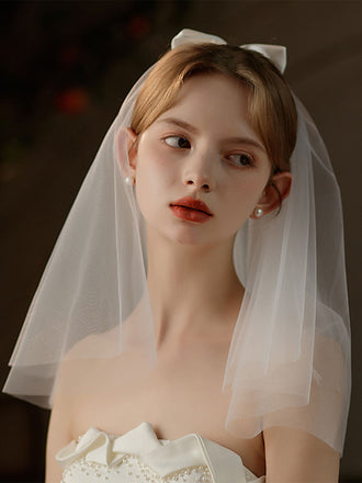 Velo da sposa con fiocco bianco vintage