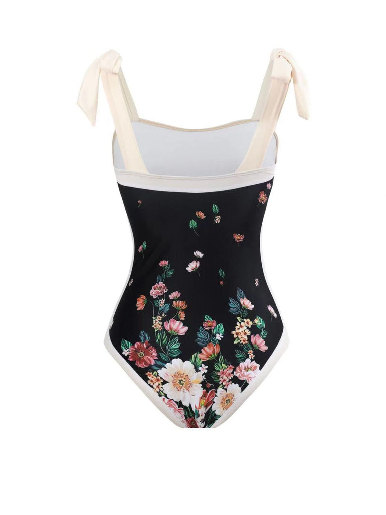 Costumi intero e copricostume floreale con fiocco nero anni '40