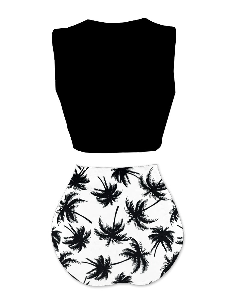 Black sleeveless top and white shorts with black palm tree pattern on a white background