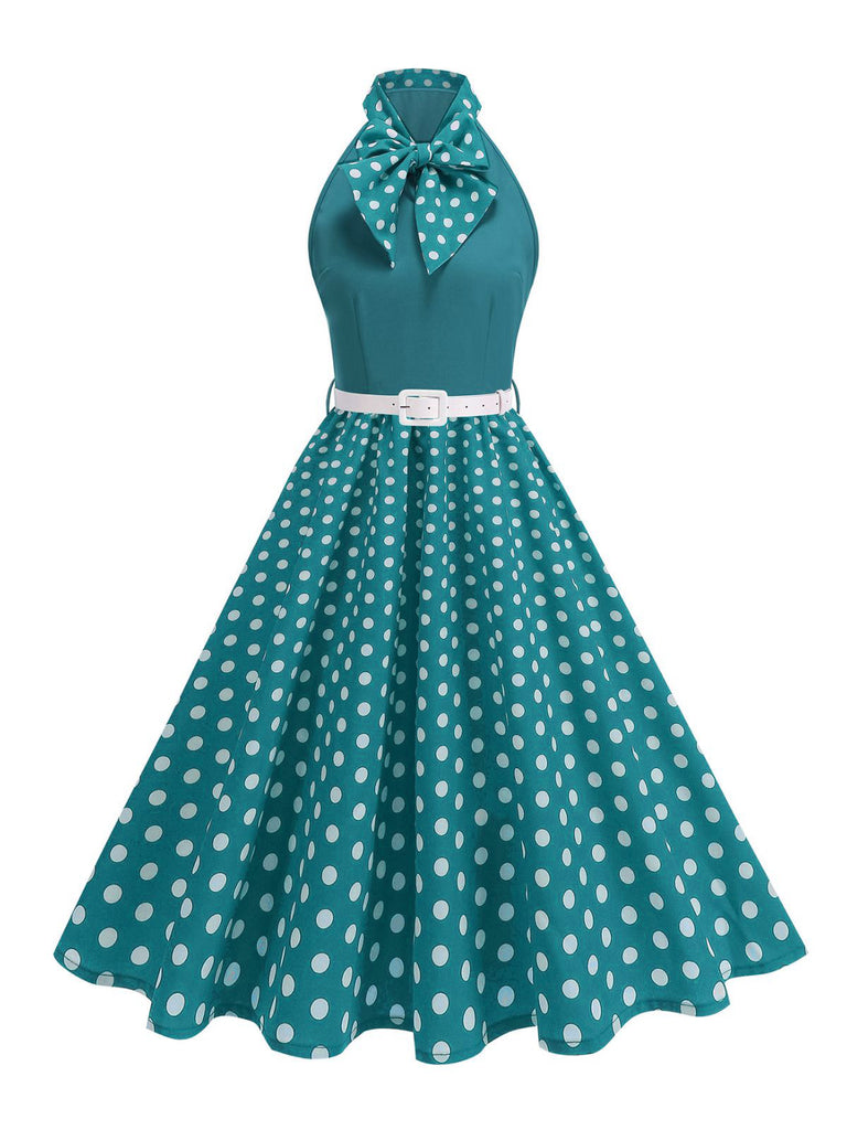 Abito a pois con cintura e collo a fiocco anni '50