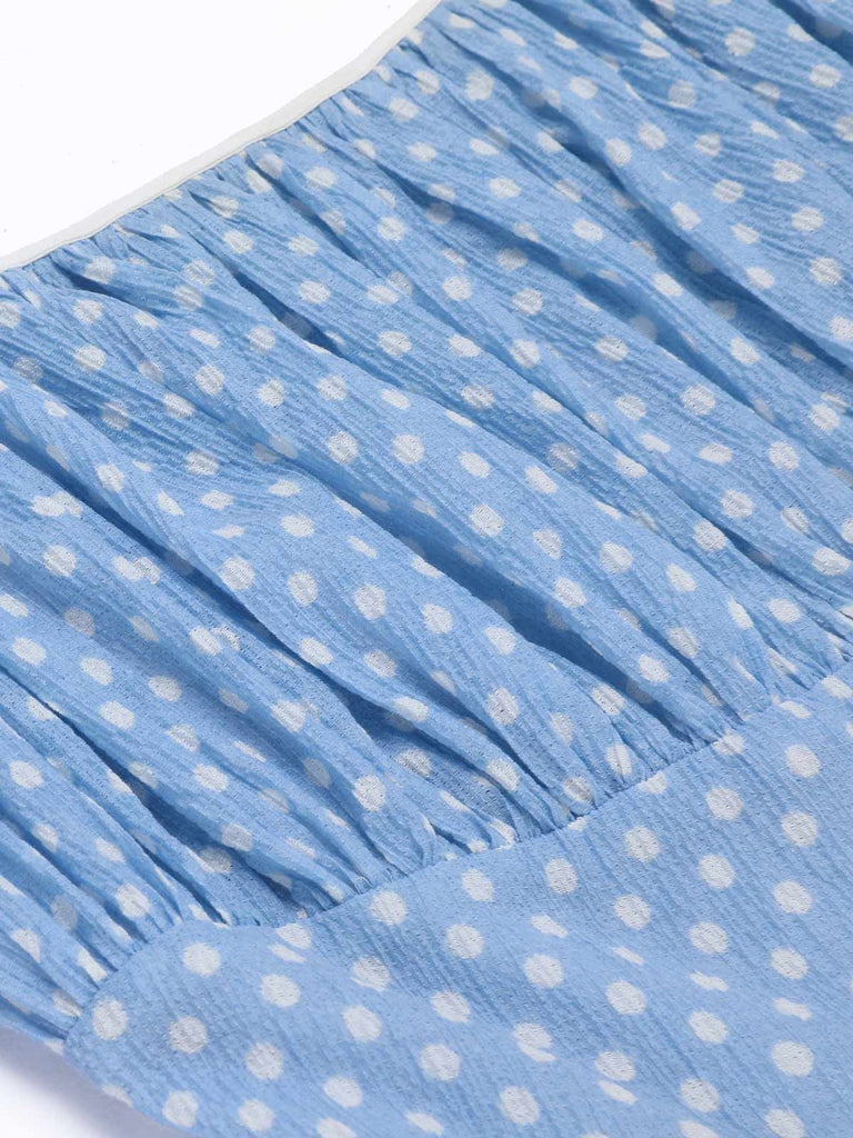 Abito azzurro a pois con cinturini anni '50