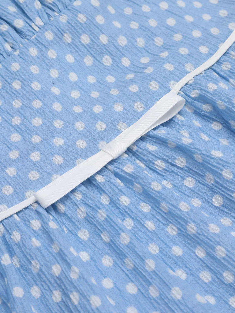 Abito azzurro a pois con cinturini anni '50