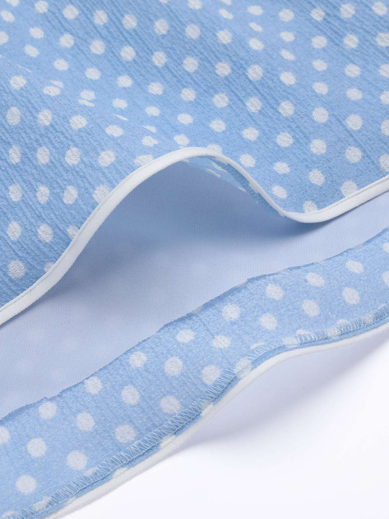 Abito azzurro a pois con cinturini anni '50