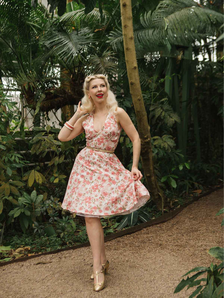 Abito scollo a V floreale colore arancione anni '50