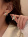 Orecchini vintage con strass e fiocco di neve natalizio