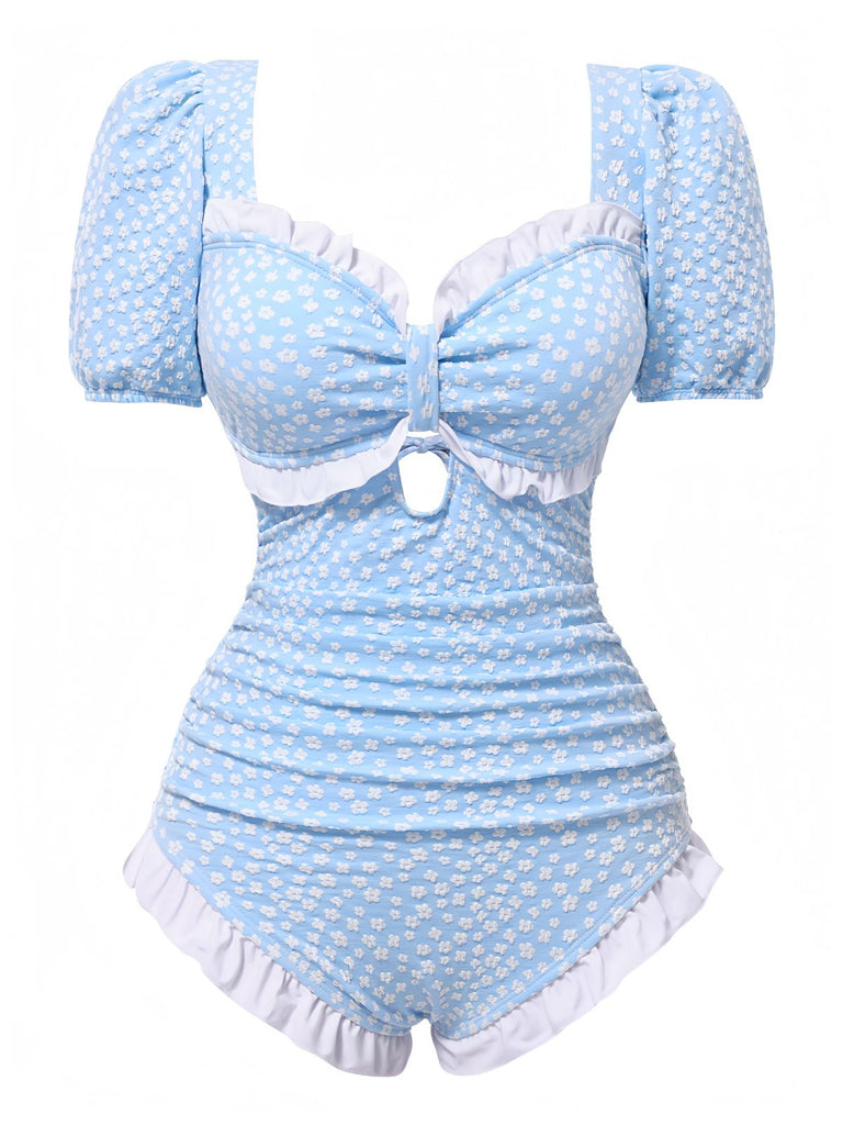 Costumi intero floreale con volant blu anni '40