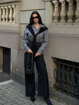 Tuta lunga a righe patchwork e mantello nero anni '40