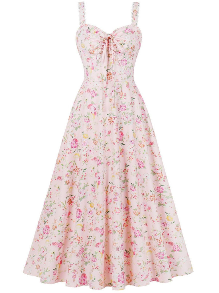 Abito con lacci floreali e spalline larghe anni '40