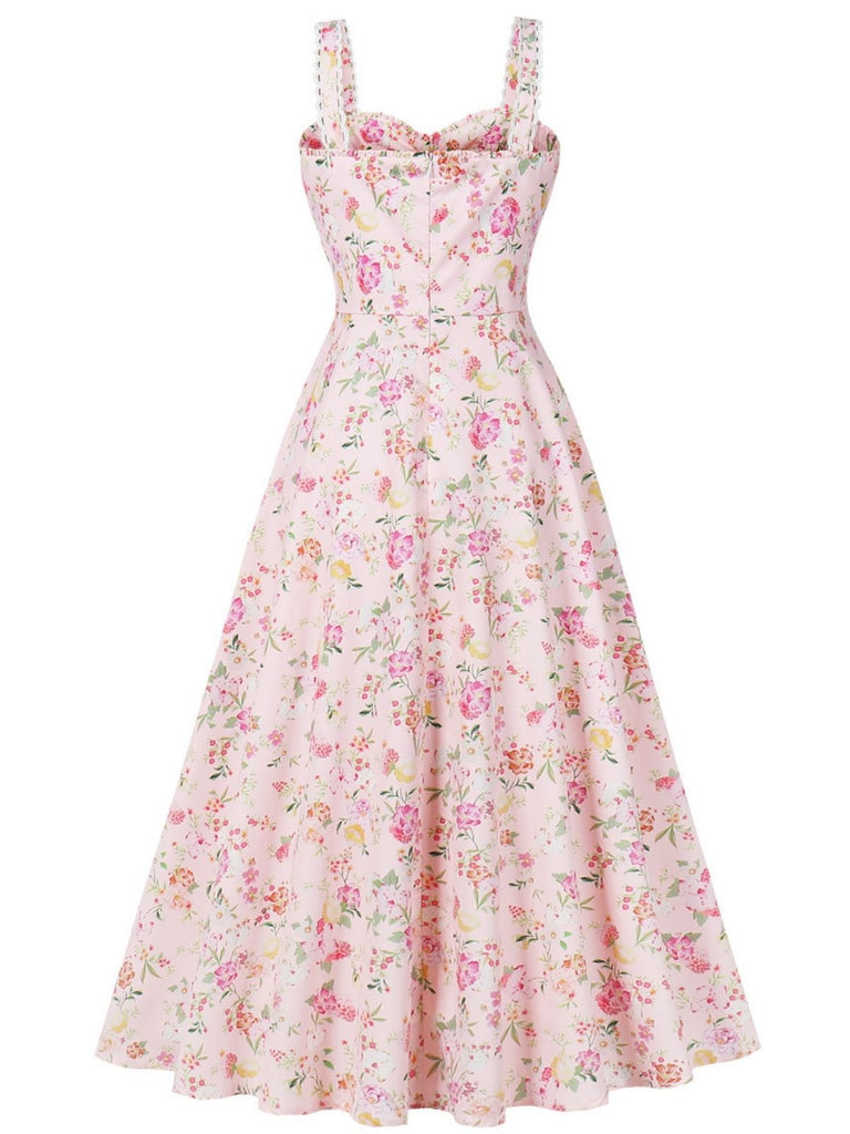 Abito con lacci floreali e spalline larghe anni '40