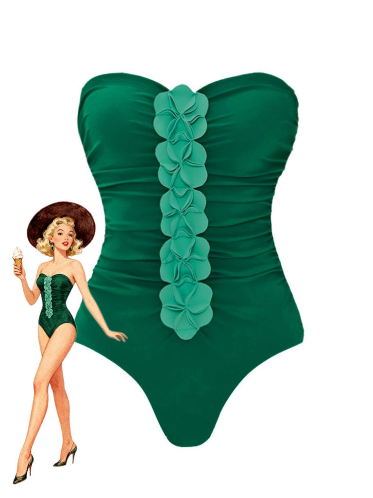 Green strapless swimsuit with floral details on a white background