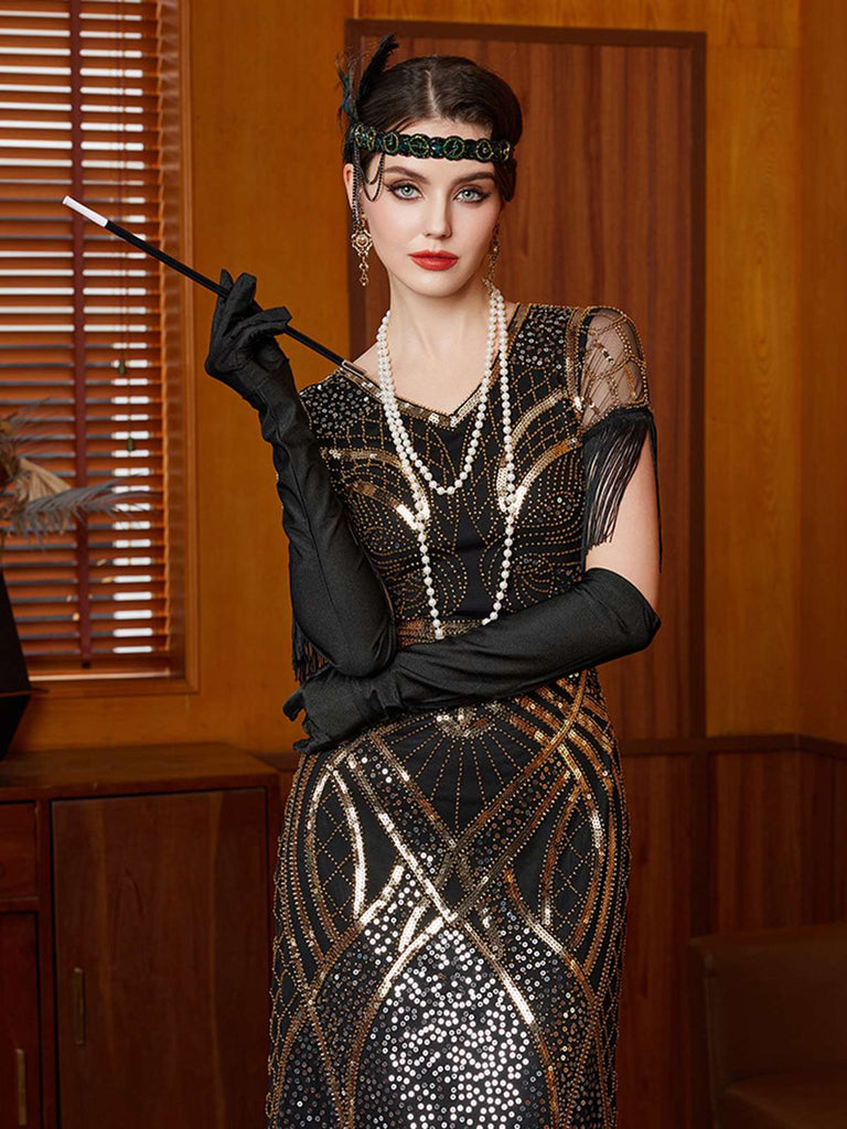 Abito lungo in paillettes e nappe con scollo a V oro anni '20