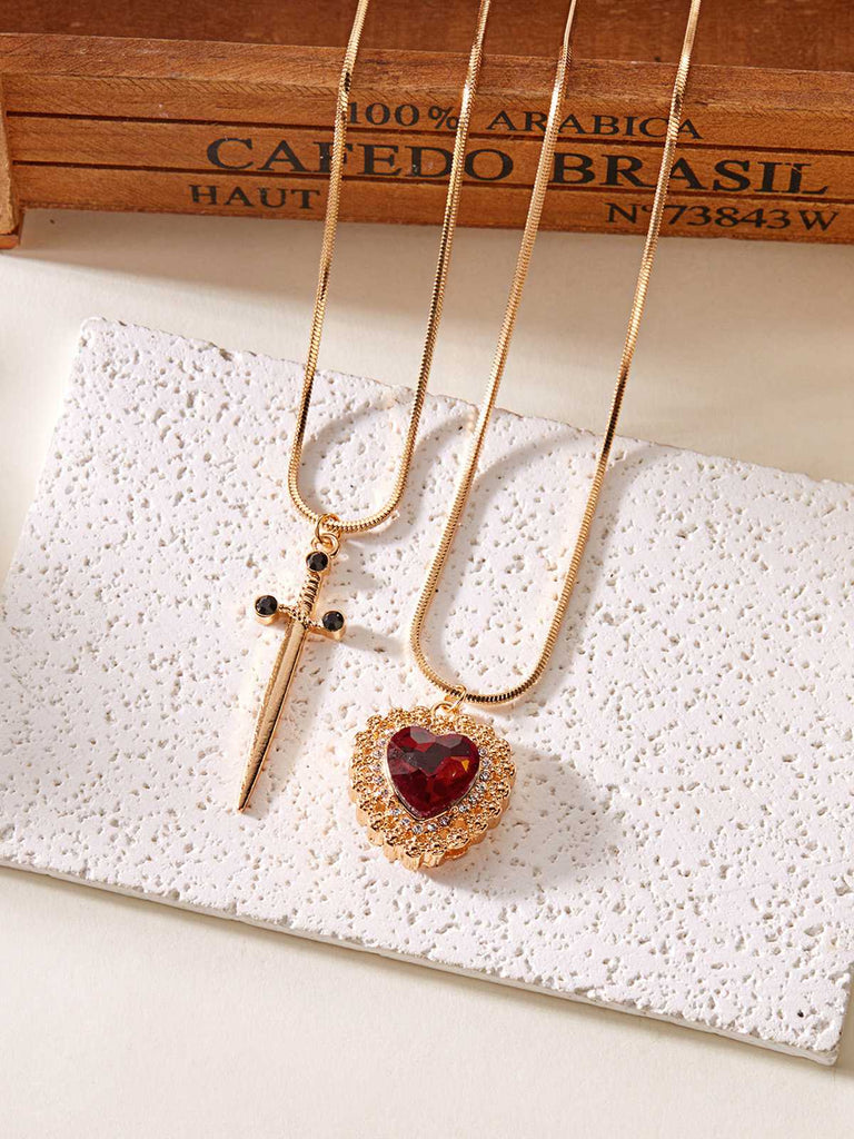 2PCS Collana con rubino a forma di cuore e spada in strass
