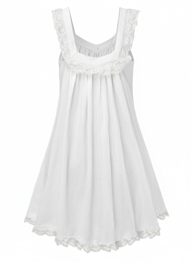 Abito babydoll in pizzo con fiocco sulla schiena anni '60