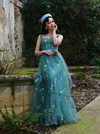 Abito floreale in rete con lacci e stecche verde anni '30