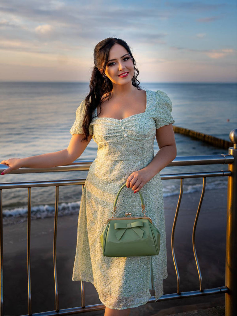 Abito a fiori scollo a cuore verde anni '40