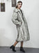 Cappotto lungo in pelliccia sintetica con risvolto anni '30