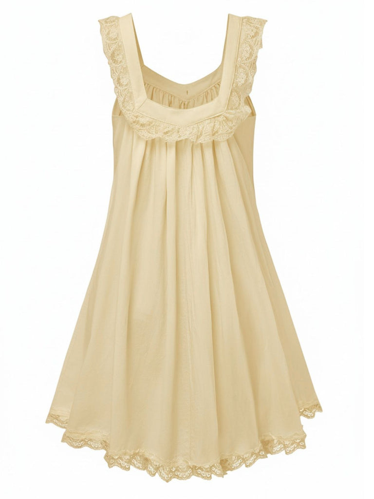 Abito babydoll in pizzo con fiocco sulla schiena anni '60