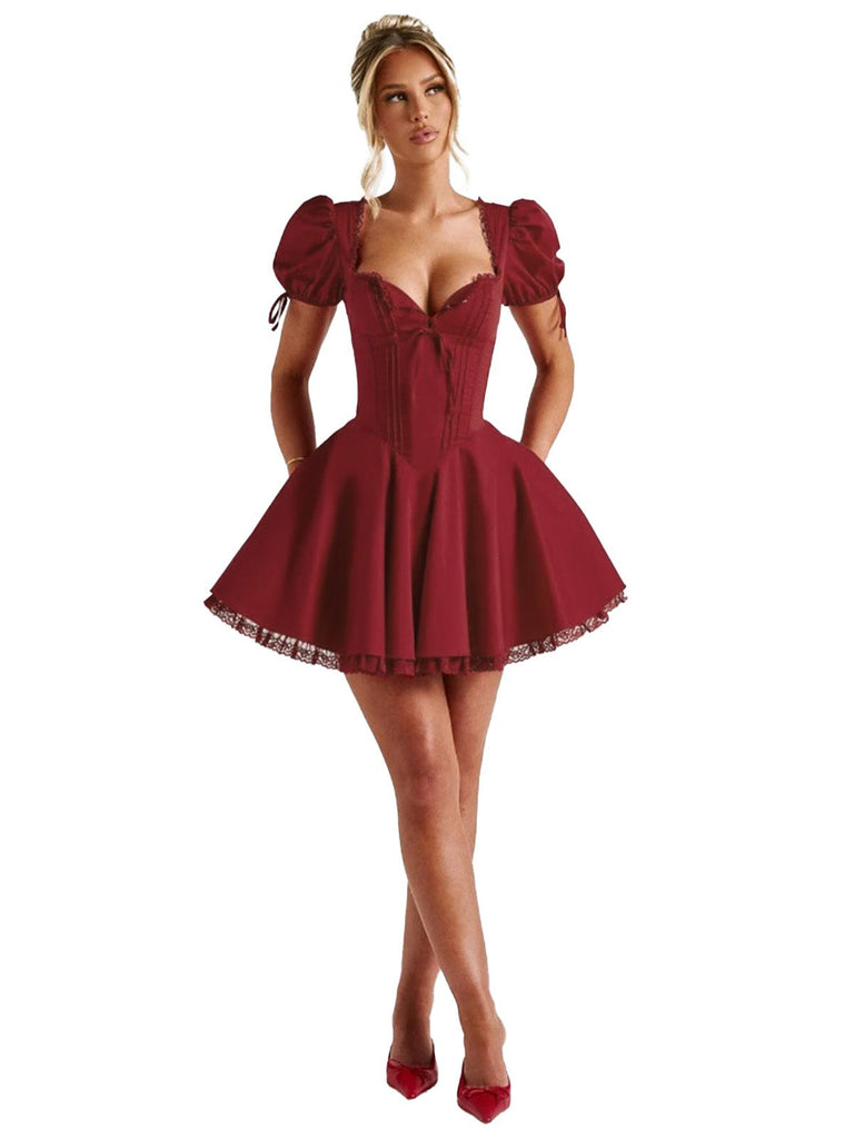 Abito con maniche a sbuffo e lacci rosso anni '60