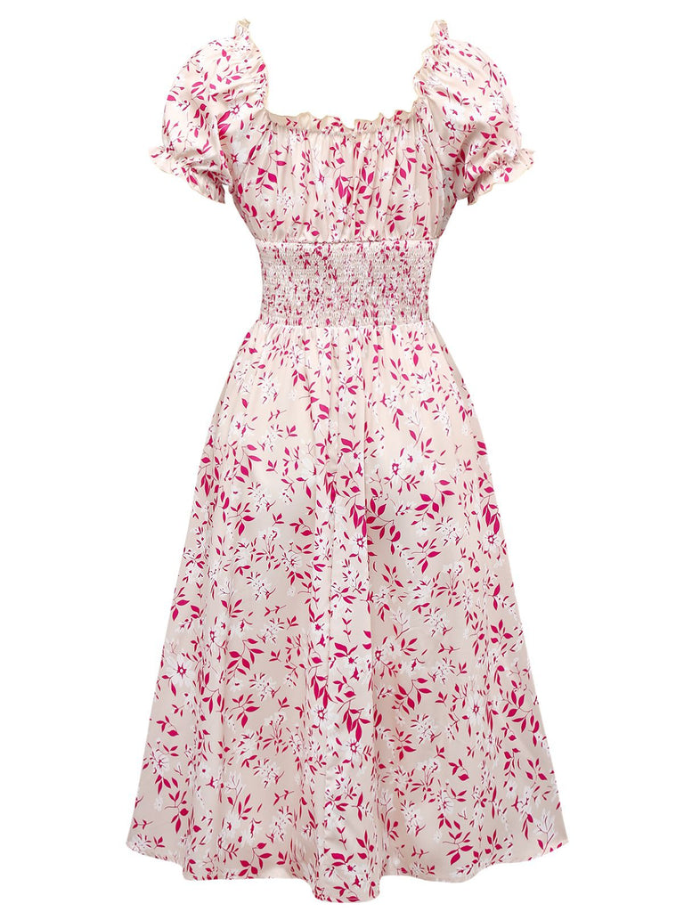 Abito floreale con scollo a V e maniche a sbuffo rosa anni '40