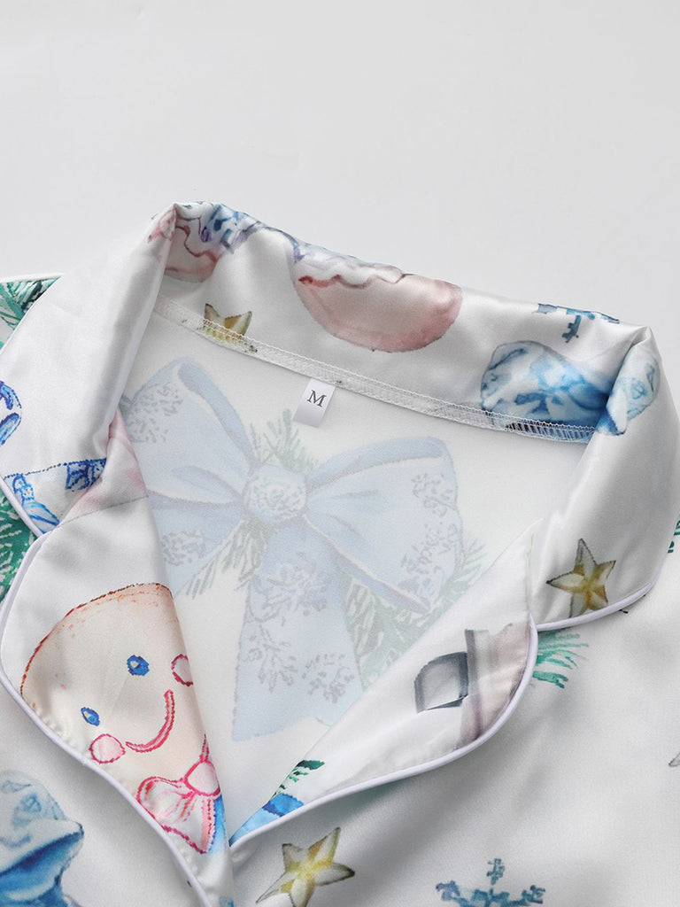 Pigiama natalizio con bastoncini di zucchero e schiaccianoci blu anni '40