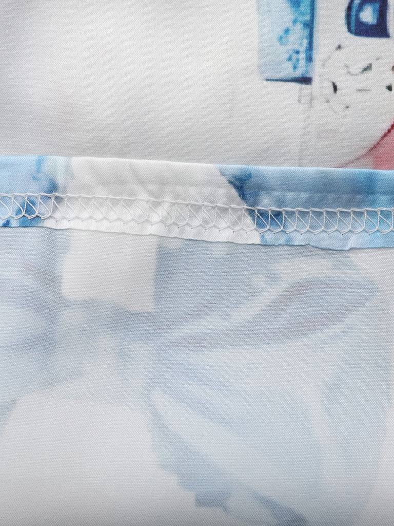 Pigiama natalizio con bastoncini di zucchero e schiaccianoci blu anni '40