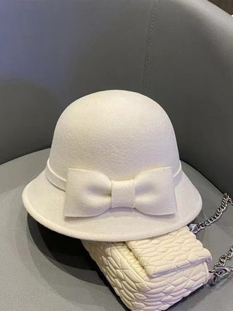 Cappello a cloche con fiocco in lana sintetica