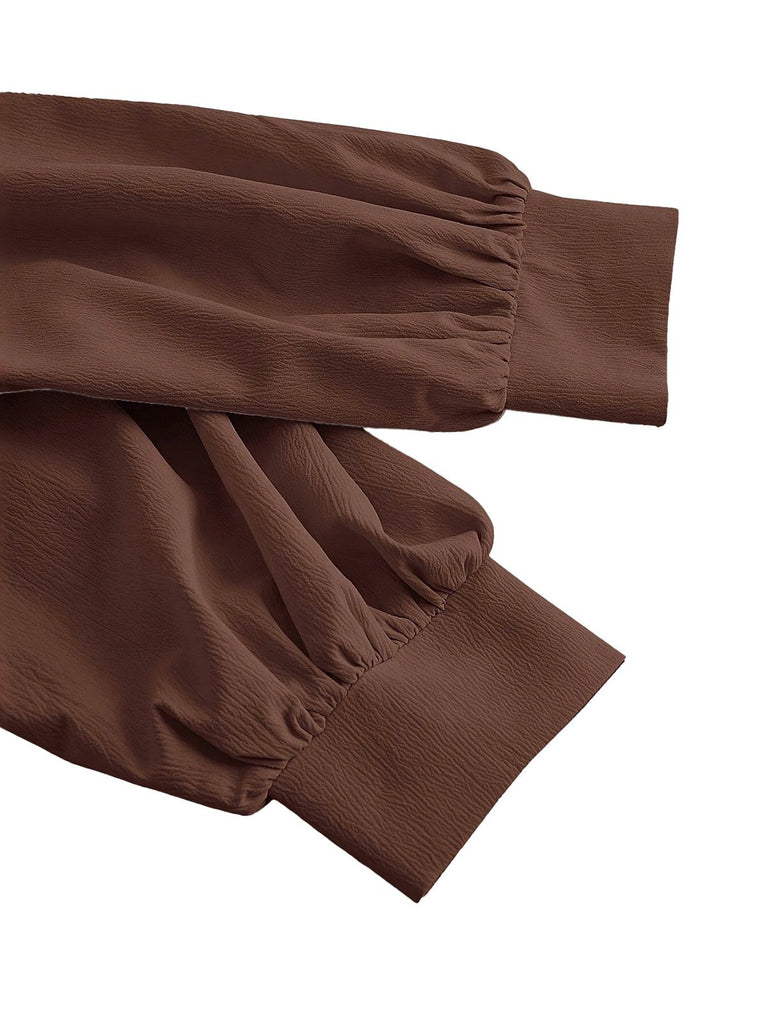 Camicetta con revers con maniche a lanterna e vita aderente anni '30