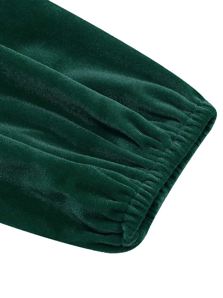 Abito natalizio in velluto con scollo quadrato e maniche lunghe anni '50