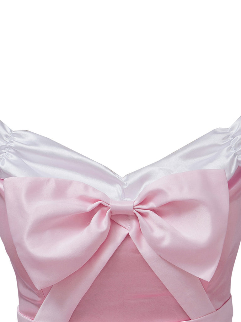 Abito da principessa con fiocco in raso spalle scoperte rosa anni '50