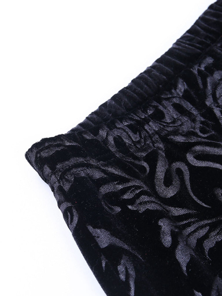 Pantaloni bootcut in velluto con stampa punk anni '80