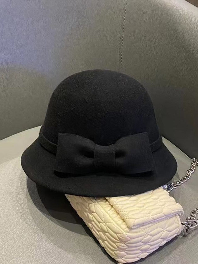 Cappello a cloche con fiocco in lana sintetica