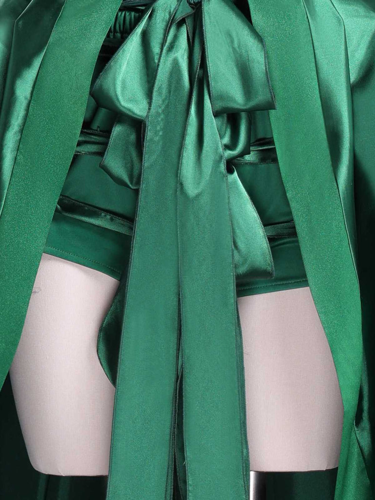 Costume ispirato a Mercoledì Agnes in raso verde anni '50